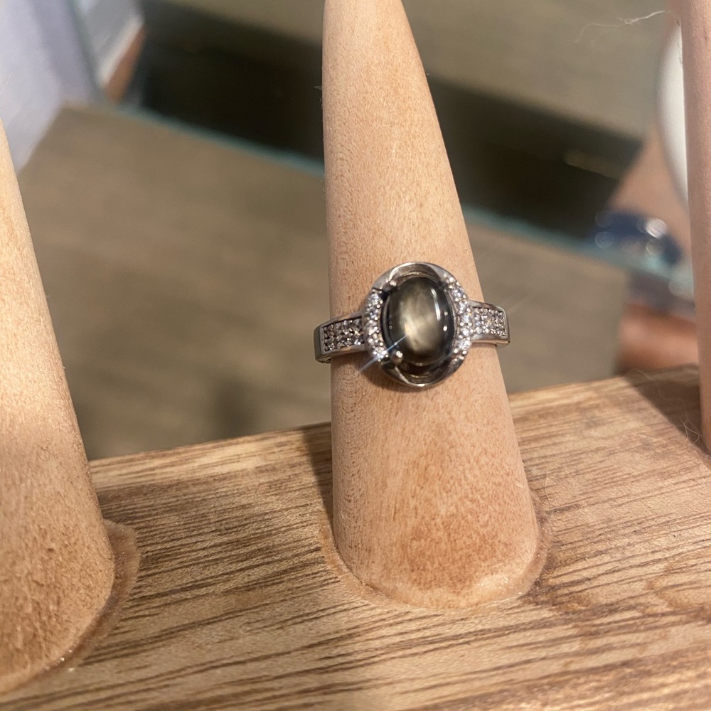 Black Star Sapphire and White Gems Atop Sterling Silver